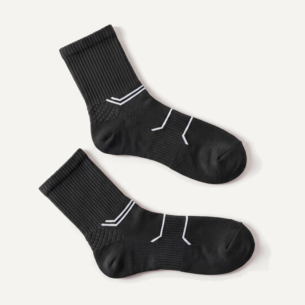 Crew Compression Socks in Black, pair laid flat