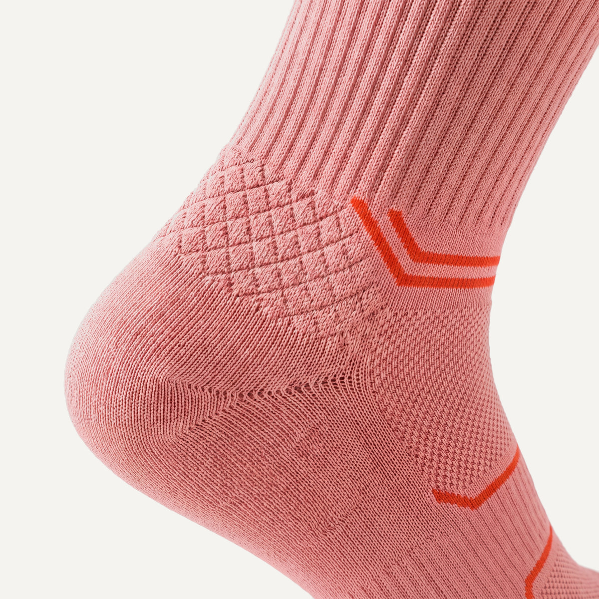 Crew Compression Socks in Coral Pink, close-up of the knit