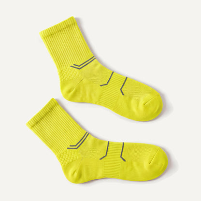 Crew Compression Socks in Neon Yellow, pair laid flat