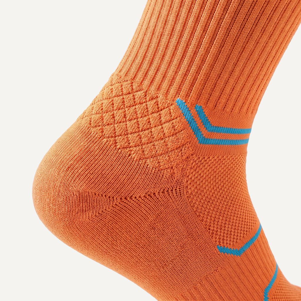 Crew Compression Socks in Orange, close-up of the knit