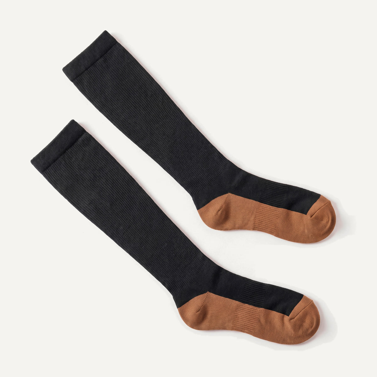 Knee-High Compression Socks in Black & Copper, pair laid flat