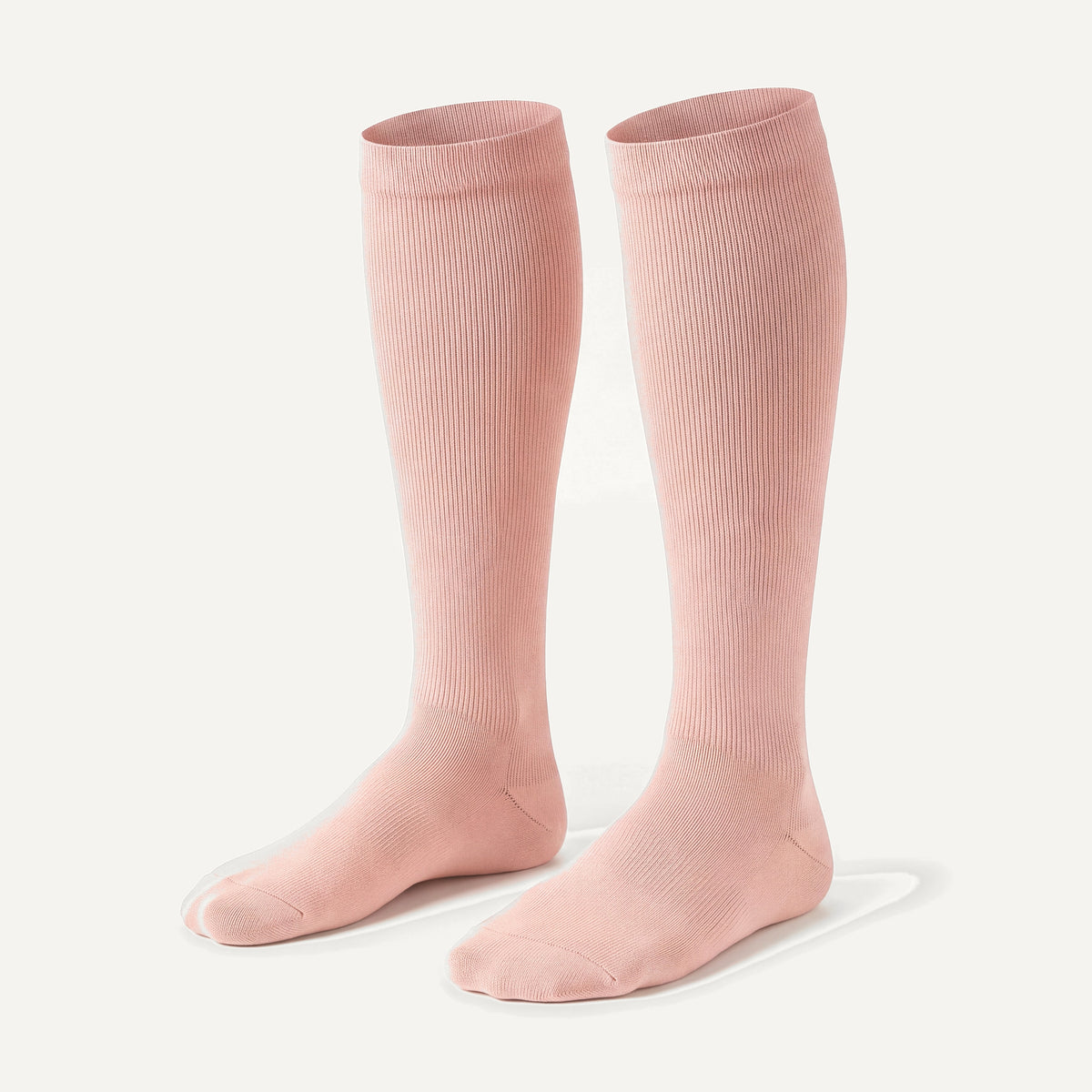 Knee-High Compression Socks in Blush, pair, front three-quarter view