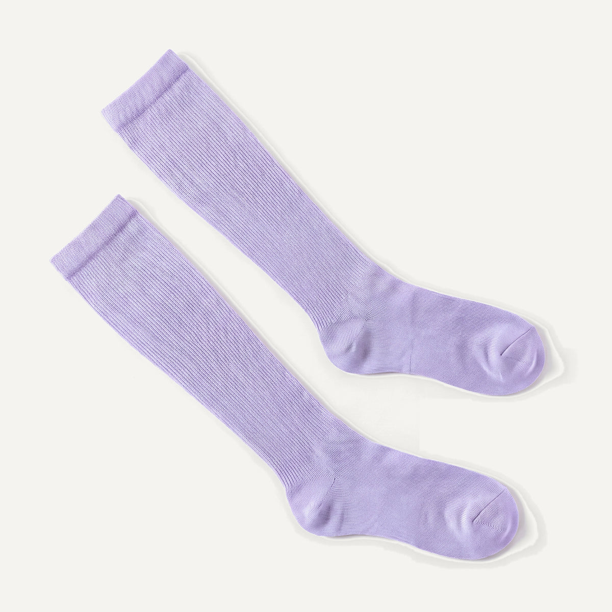 Knee-High Compression Socks in Lilac, pair laid flat