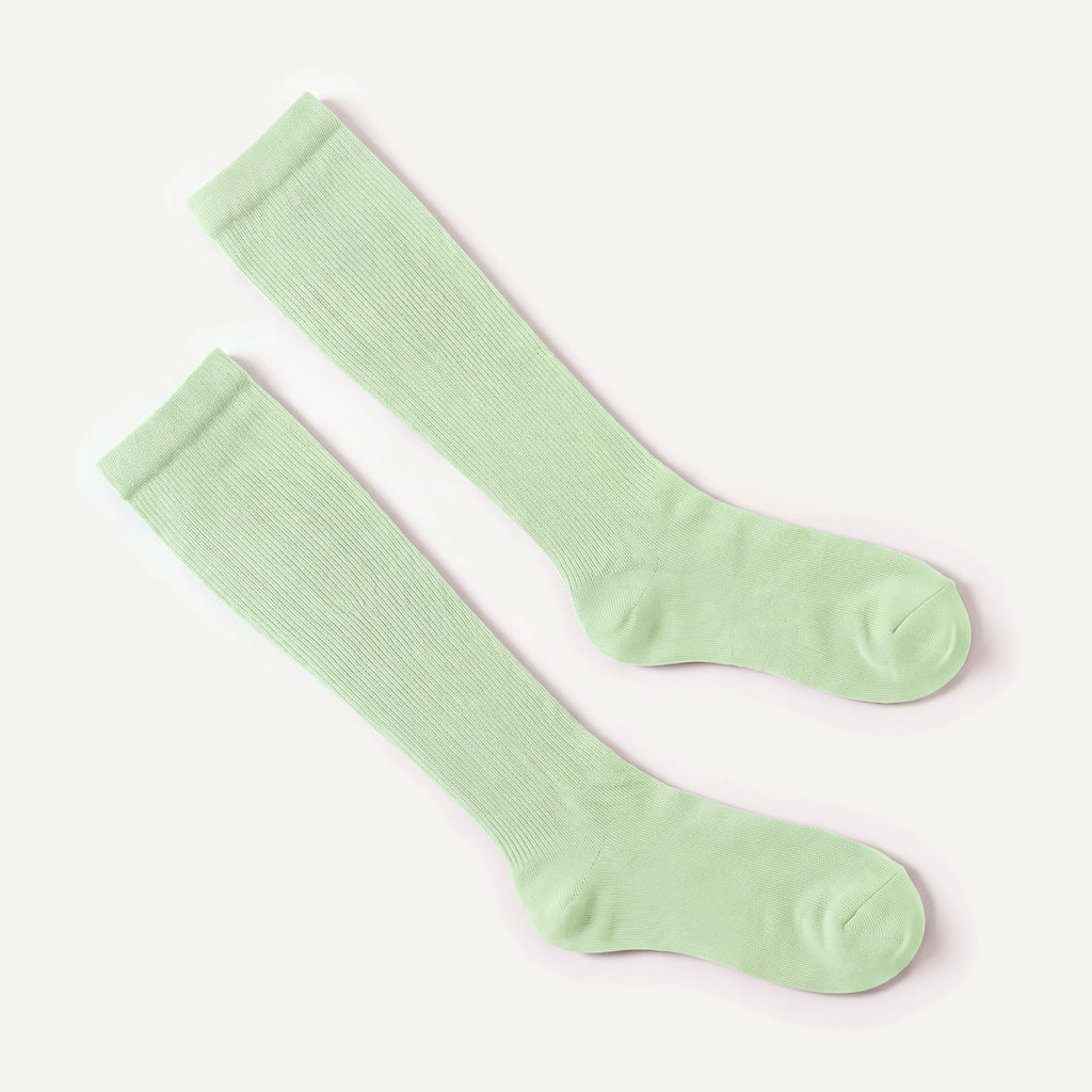 Knee-High Compression Socks in Mint, pair laid flat