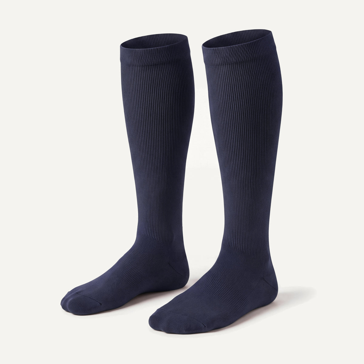 Knee-High Compression Socks in Navy, pair, front three-quarter view