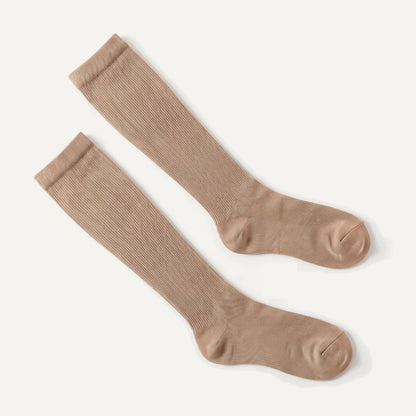 Knee-High Compression Socks in Nude, pair laid flat