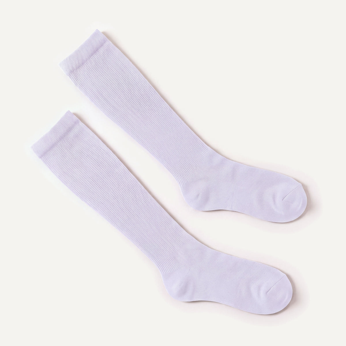 Knee-High Compression Socks in Pale Lavender, pair laid flat