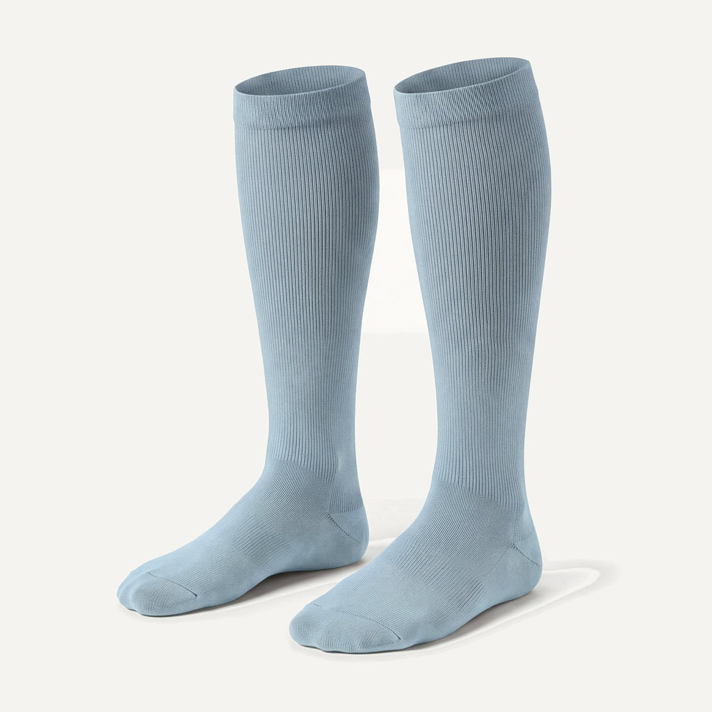 Knee-High Compression Socks in Powder Blue, pair, front three-quarter view