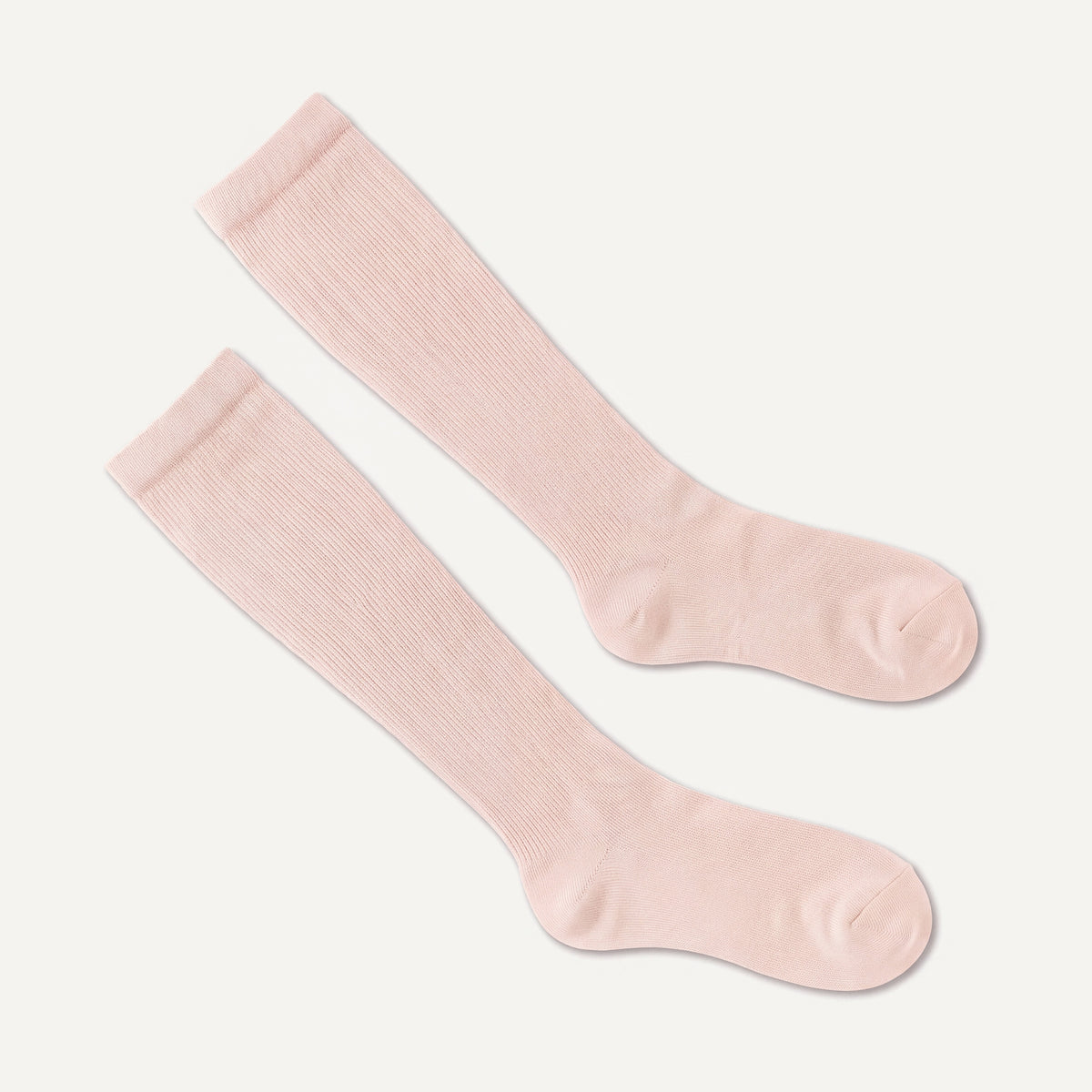 Knee-High Compression Socks in Shell, pair laid flat