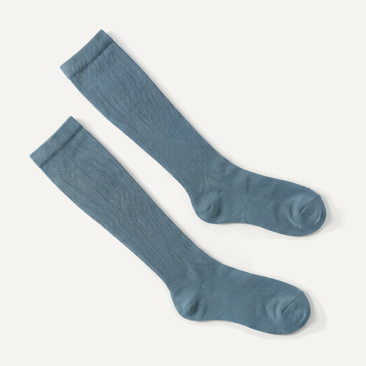 Knee-High Compression Socks in Slate Blue, pair laid flat