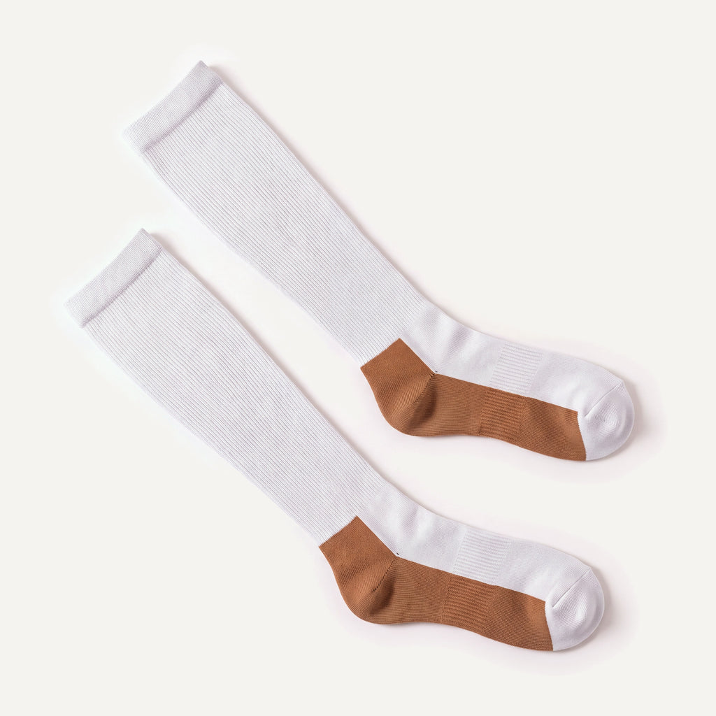 Knee-High Compression Socks in White & Copper, pair laid flat