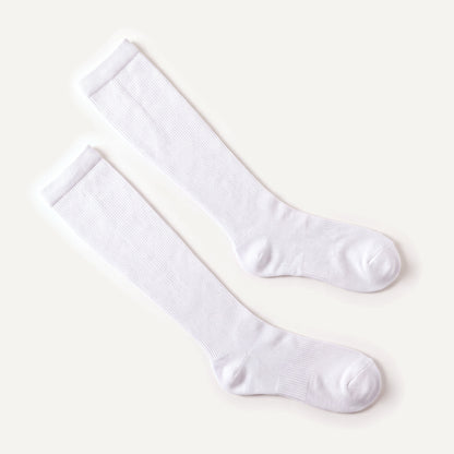 Knee-High Compression Socks in White, pair laid flat