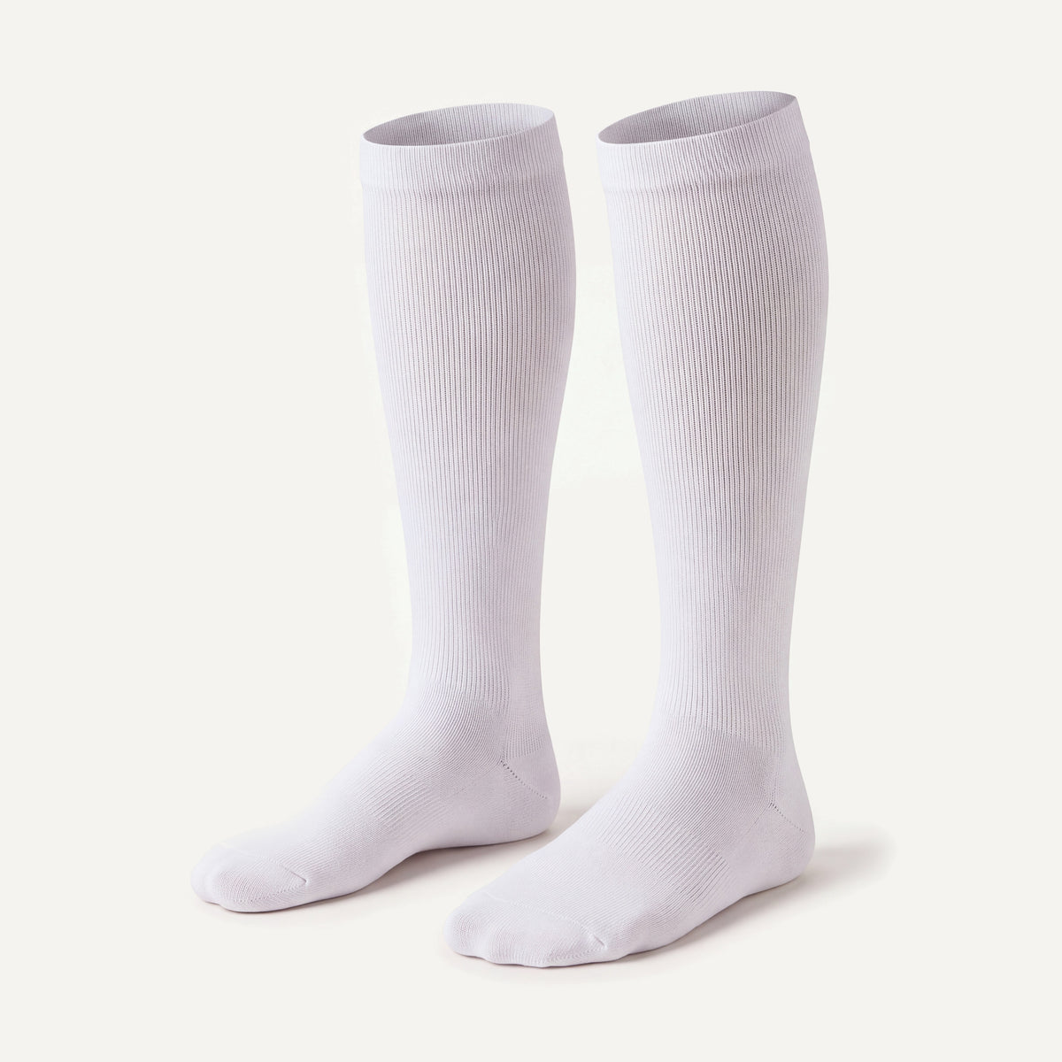 Knee-High Compression Socks in White, pair, front three-quarter view