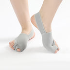 Bunion Gel Sleeves in Grey, worn on the foot, side view