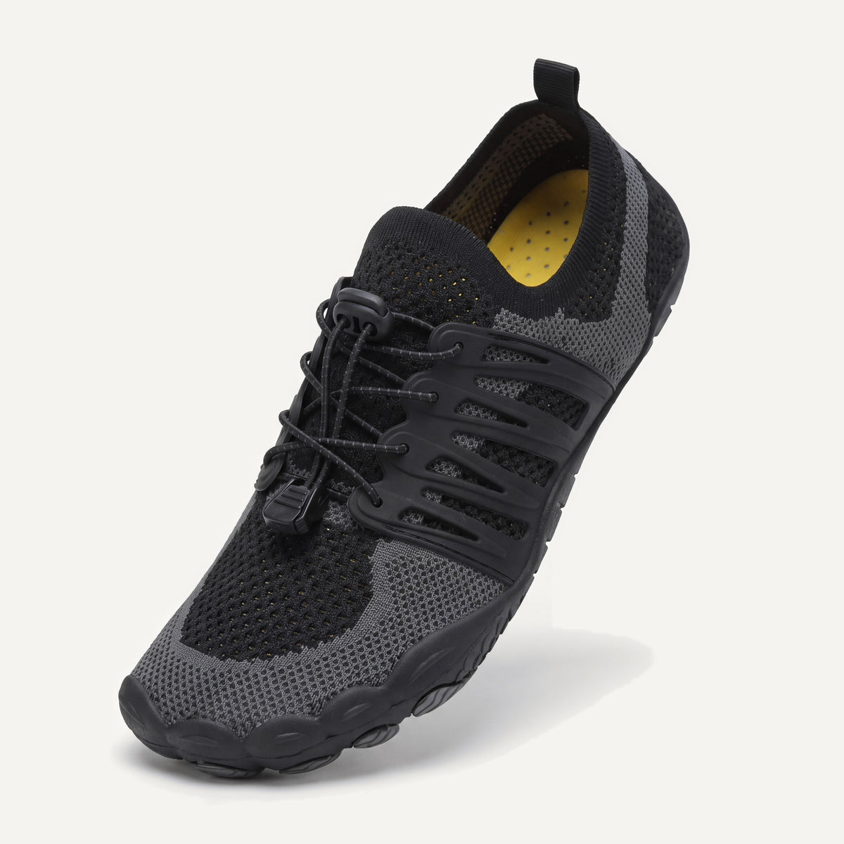 Attività Vie in Black, standing on the toe, top view of the laces