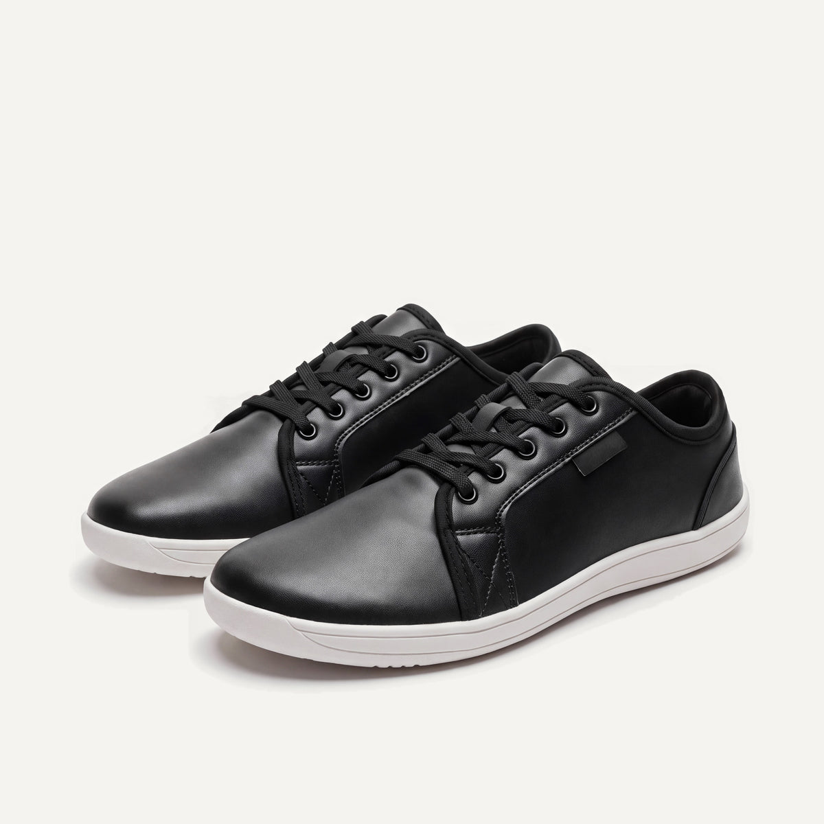 Pelle Vie in Classic (black upper, white sole), pair, front three-quarter view