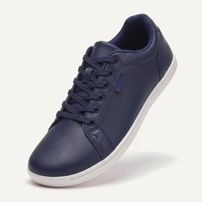 Pelle Vie in Dark Navy, standing on the toe, top view of the laces