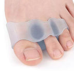 Toe Spacers in Clear, close-up on the foot