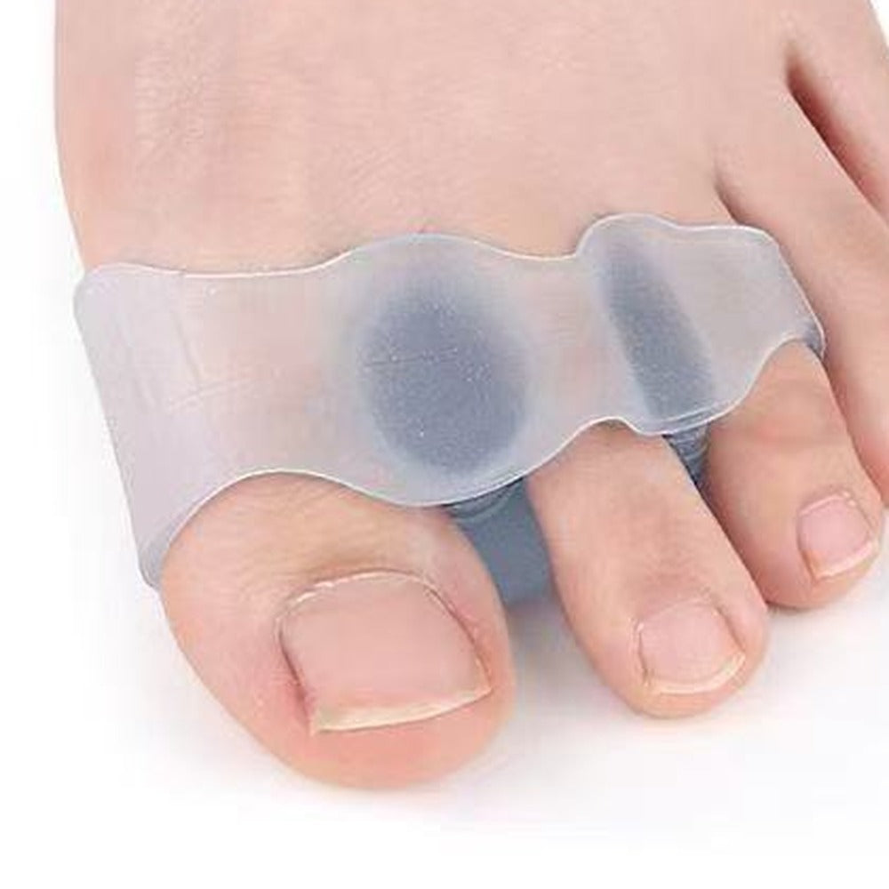 Toe Spacers in Clear, close-up on the foot